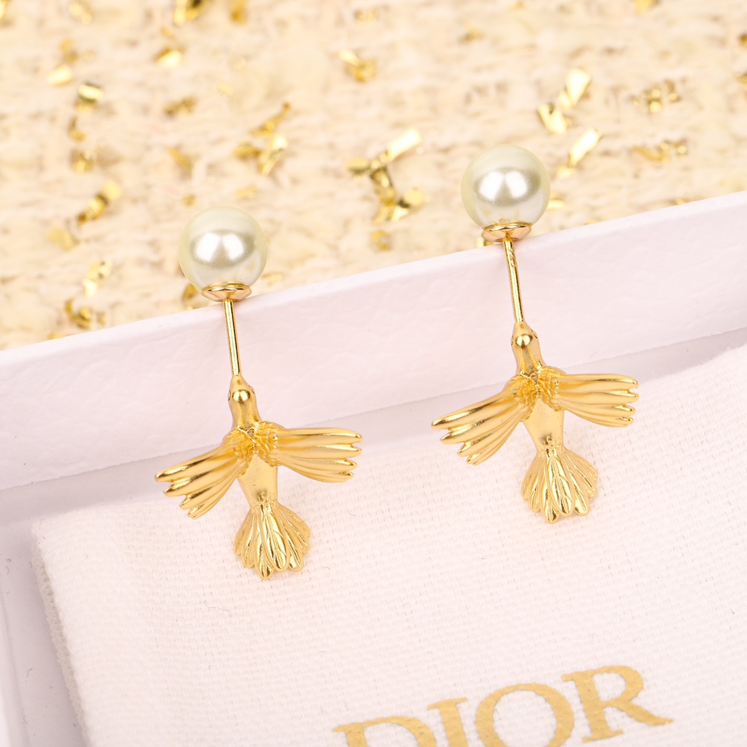 Gold bird earrings
